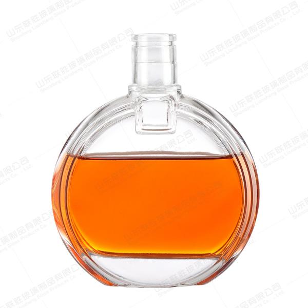 Quality 350ml 500ml 700ml Round Glass Liquor Decanter with Hot Stamping and Engraved Glass Lid wholesale