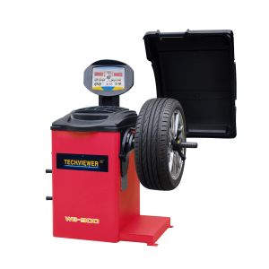 Wheel balancer alignment machine for passenger vehicle