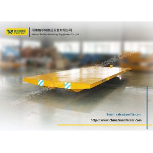 Yellow no - powered tow tailer for industrial assembly line with moving platform