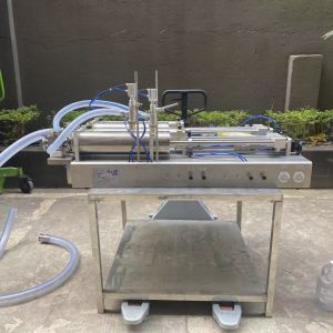 Pneumatic 2 Nozzles Liquid Filling Machine 30~250ml CE certificate