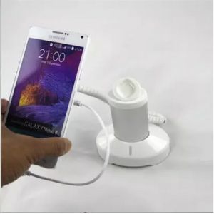COMER tablet pad mini counter stand with alarm sensor and charging cable for