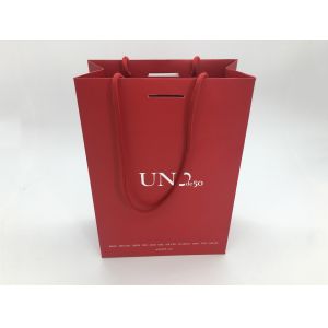 China Red Bottom Folding Branded Paper Bags With Cotton Rope , Silver Foil Logo on sale