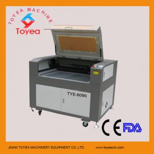 Cheap Cloth Laser cutting machine with cellular table TYE-6090 for sale