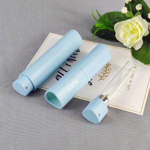 Wholesale Triangle Shape 8ml Twist up Refillable Plastic Atomizer Mini Travel