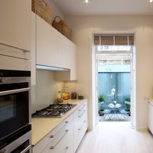 China Custom White Simple Style Kitchen Cabinets Matt Melamine Kitchen Cabinets on sale