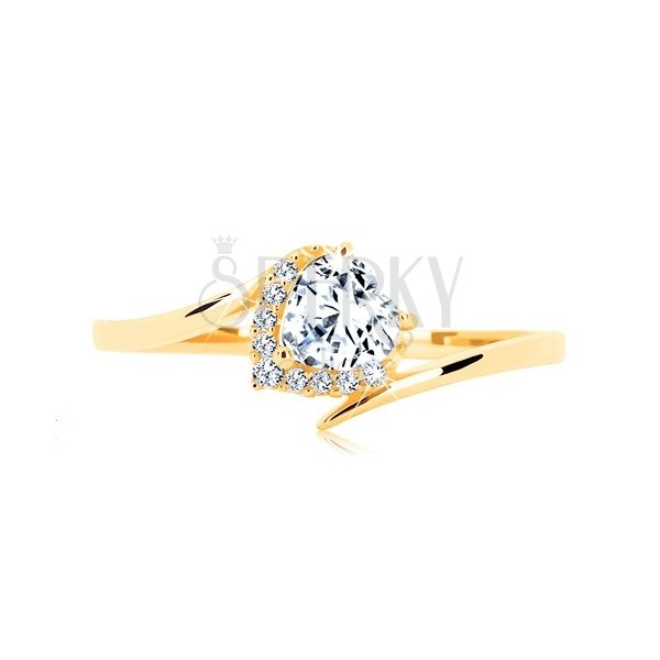 9K Gold Ring, Heart Cut Zircon In Clear Colour Gripped Between Bent Ends Of Shoulders, Decorated Mount