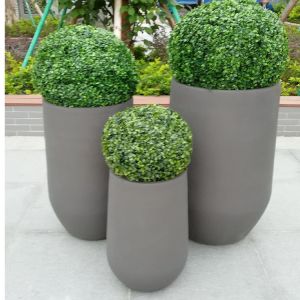 Effortlessly Elevate Your Plant Display With Fiber Clay Planters