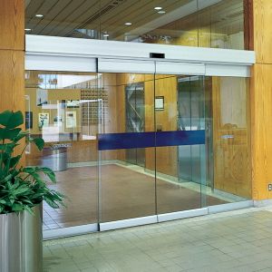 China Aluminium Automatic Sliding Glass Door for Commercial with 60W Brushless DC Motor and microcomputer system Controller on sale