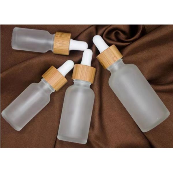 Quality BPA Free Lead Free Round 50ml Glass Dropper Bottles With Bamboo Collar wholesale