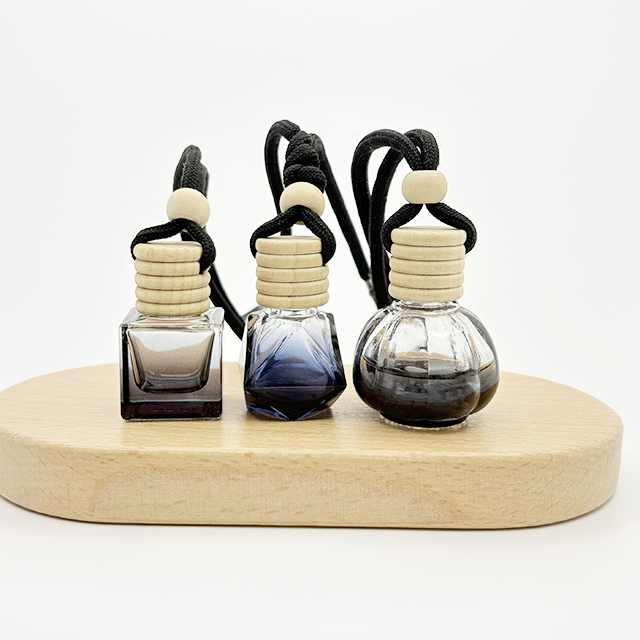 China Square Triangle Black Glass Screw Sealed Car Perfume Bottle with Rubber Stopper Hanging Diffuser on sale