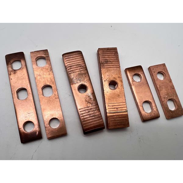 Quality Custom Copper Terminal Plates – Precision Stamped Electrical Busbar Contact Pads with Mounting Holes and Anti-Slip Grooves wholesale