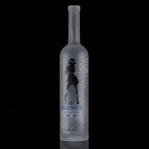 China Classic Shape 700ml 750ml Frosted Applique Vodka Glass Bottle for Beverage Packaging on sale