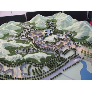 Architectural Model of Urban Master Plan with Green Landscape, Roads, and Mixed-Use Developments