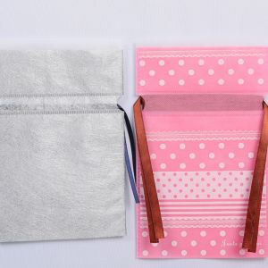Lightweight Non-Woven Drawstring Bag with Customizable Sizes 5.25x3x8.5 and 5x3