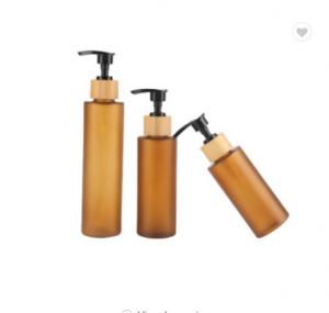 China Amber Frosted Shampoo Glass Bottle 100ml 150ml 200ml with Bamboo Lotion Pump on sale