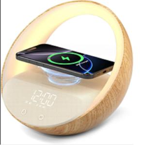 China Multifunctional Wireless Charging Speaker Bluetooth Connectivity Built-in LED Lights And Alarm Clock For Families on sale