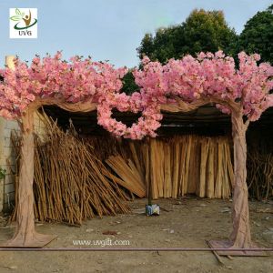 UVG wedding design in artificial sakura tree with cherry blossom branches for