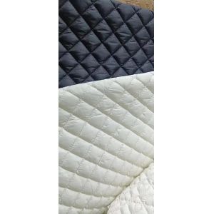 Quilting with Nylon Taslon for coating bed sheets Printed desings for fashion