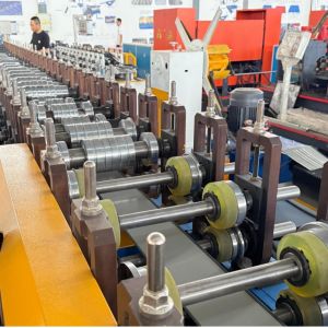 Width adjustable ridge cap rolling forming machine