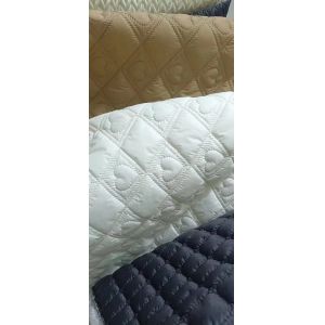 Quilting with Nylon Taslon for coating bed sheets Printed desings for fashion