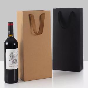 China Cmyk Printed Paper Carrier Bags 11*35*9cm Kraft Wine Bottle Bags on sale