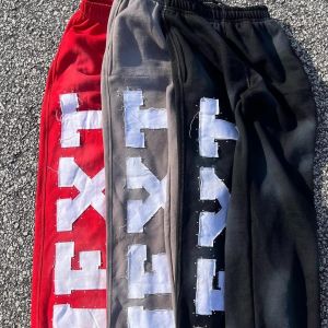 China Custom Men's Sweatpants Embroidered Patch Streetwear Tracksuit 2-Piece Tracksuit Set Letter Applique Embroidery OEM Design on sale