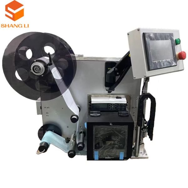 Beverage Labeling Systems with Real Time Printing and Top Side Application