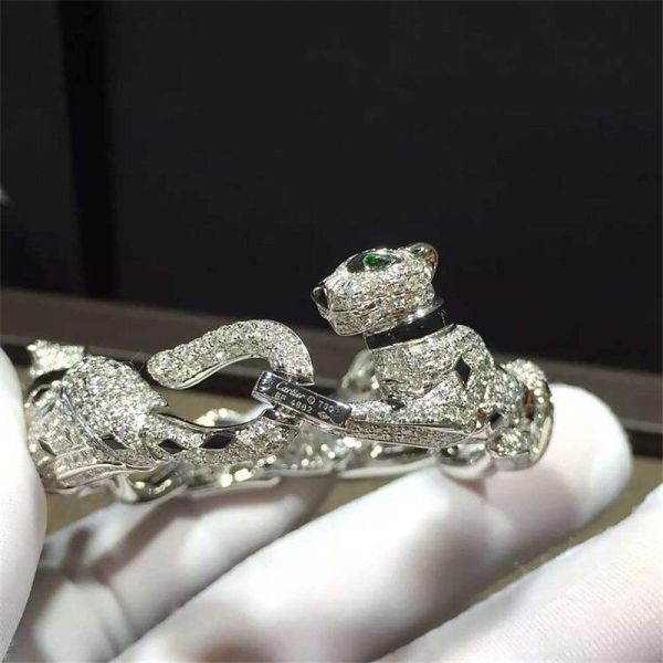 C Cheetah bracelet - showing the charm of courage, naughty or docile .18K gold