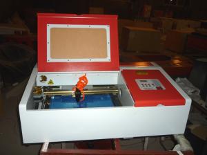 Cheap Desktop Laser Engraver Co2 Laser Engraving And Cutting Machine For Carving Chapter And Artistic Works for sale