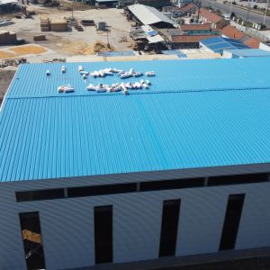Q235B Prefab Steel Warehouse Building with Aluminized Zinc Cladding