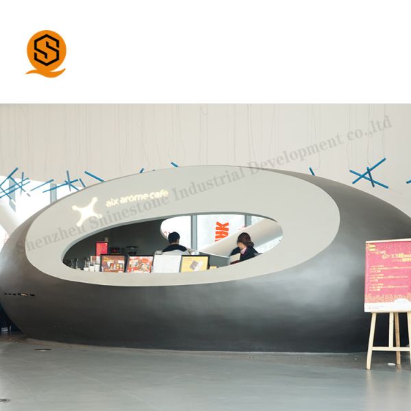 Quality Glossy Artificial Stone Black Salon Reception Desk Round Reception Counter wholesale