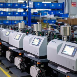 High Precision Helium Leak Detector with Dual Ion Sources