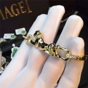 C Cheetah bracelet - showing the charm of courage, naughty or docile .18K gold
