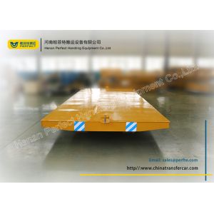 Yellow no - powered tow tailer for industrial assembly line with moving platform