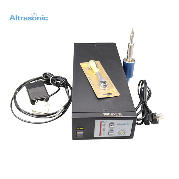 Black Ultrasonic Cutting Machine For Themoplastic Triming Installed On Machine